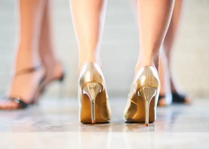 gold color shoes with red dress